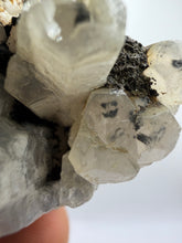 Load image into Gallery viewer, Clear Pagoda stepped “poker chip” Calcite